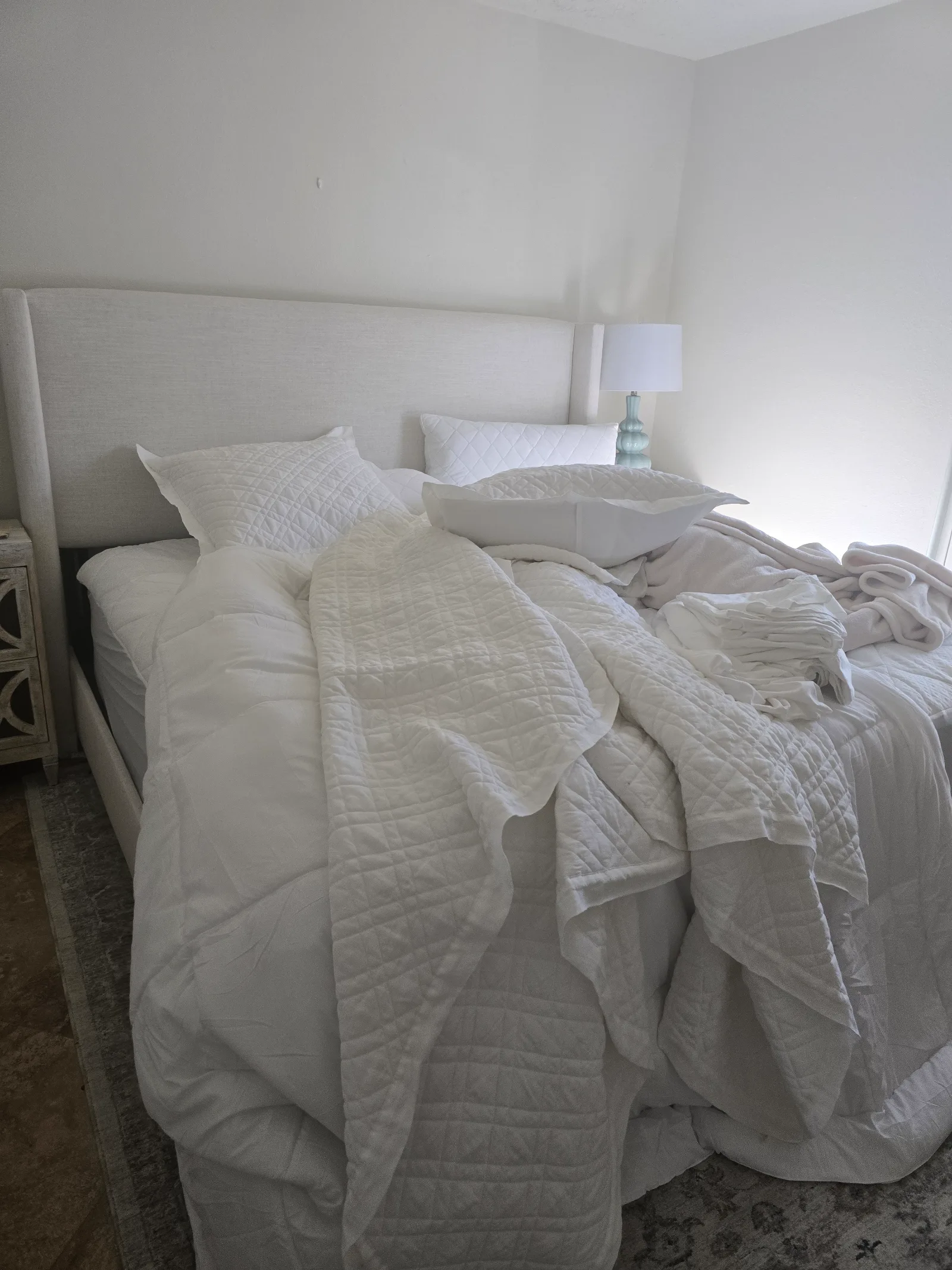 Bedroom refresh with beds made — before cleaning
